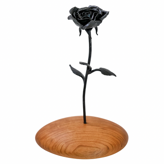 Iron Rose on Cherry Wood