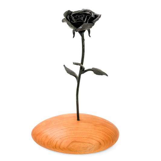 Iron Rose on Cherry Wood